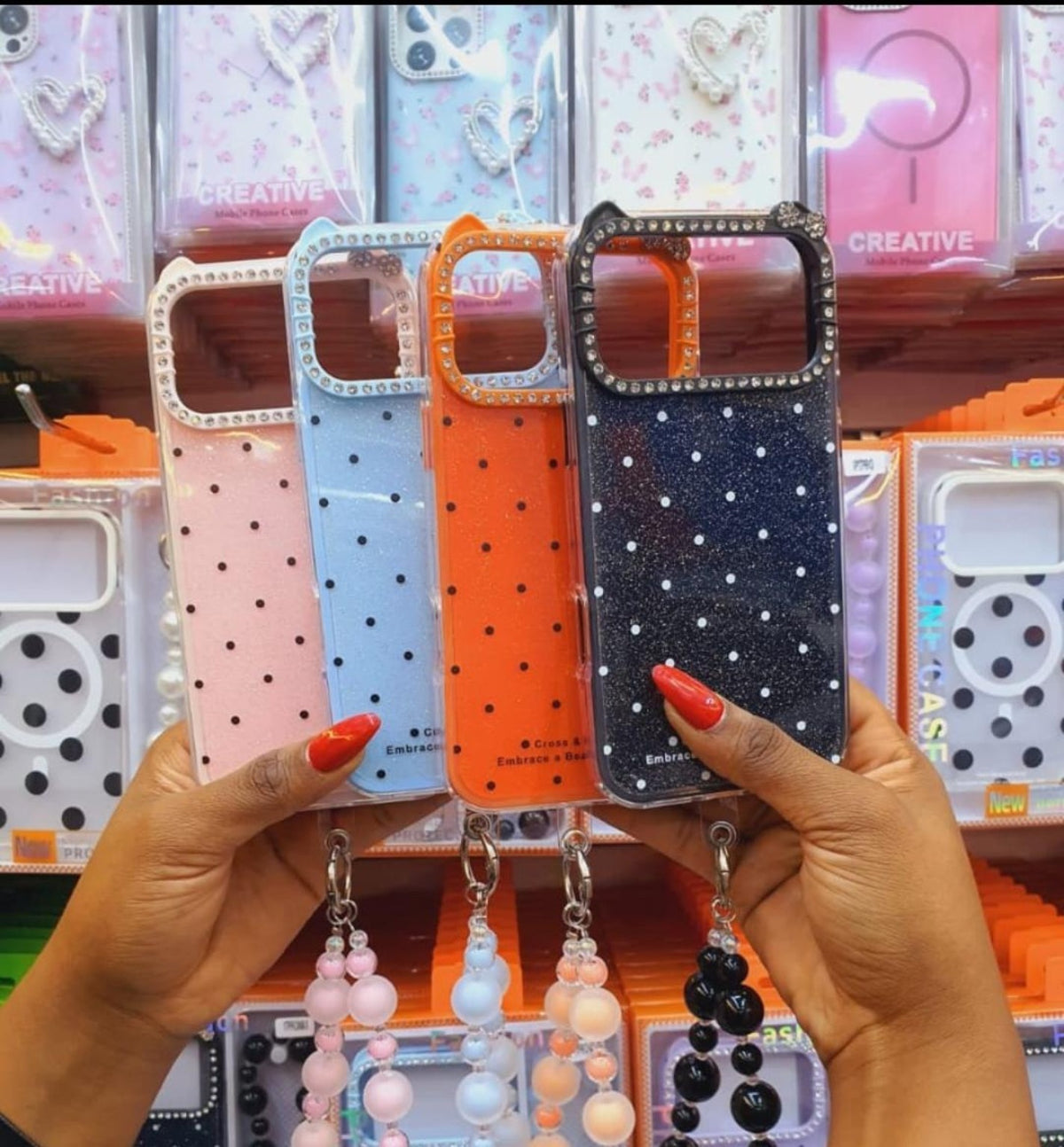 Creative rhinestone phone cases for iPhone models in multiple colours