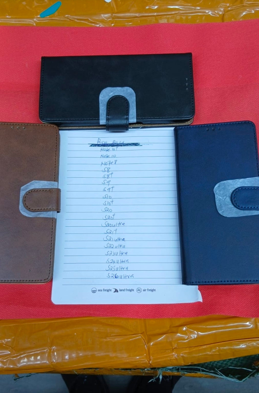 Rich Boss leather-style wallet phone cases in black, brown and blue